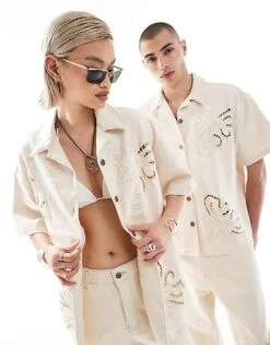 Reclaimed Vintage Unisex Cropped Boxy Denim Shirt With Embroidery Cutwork In Cream For Unisex Ivory -Closet Theory Her 206122925 1 ivory 1