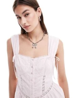 Reclaimed Vintage Washed Western Broderie Button Front Playsuit With Bows For Women Washed Tbc -Closet Theory Her 206219918 4