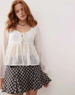 Reclaimed Vintage Tie Front Top With Peplum Hem And Bow Embroidery In White Chiffon For Women Ivory -Closet Theory Her 206763637 1 ivory 1