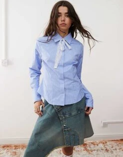 Reclaimed Vintage Cinched Waist Fitted Shirt With Lace Tie Detail In Blue Pinstripe For Women -Closet Theory Her 206815741 1 pinstripe 1